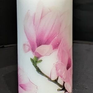 Our Magnolia blossoms are decoupaged/emboss onto a white unscented paraffin candle. A beautiful gift for someone special.