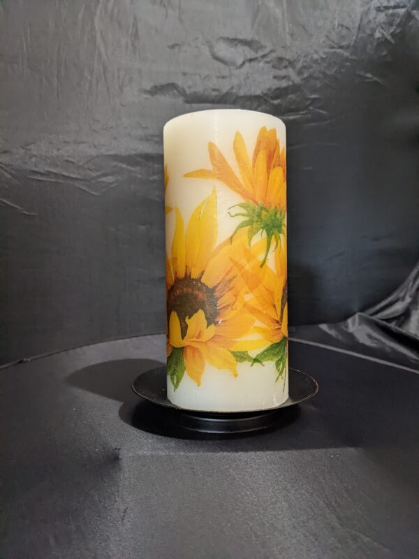 Sunflower Bouquet Tall Handmade Decoupage Candle. Our tall Beautiful individually handmade Sunflowers Candles fill you with joy, warmth, and happiness. The Sunflowers by their very nature always face the sun. They symbolize unwavering faith, with their constant orientation toward the light.